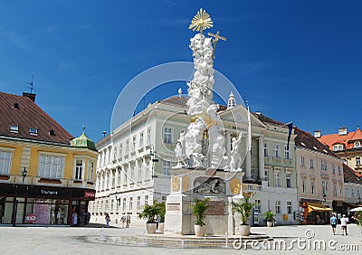 Baden bei Wien, Austria â€“ July, 2013. Plague Pillar on Hauptplatz in Baden bei Wien. Editorial Stock Photo